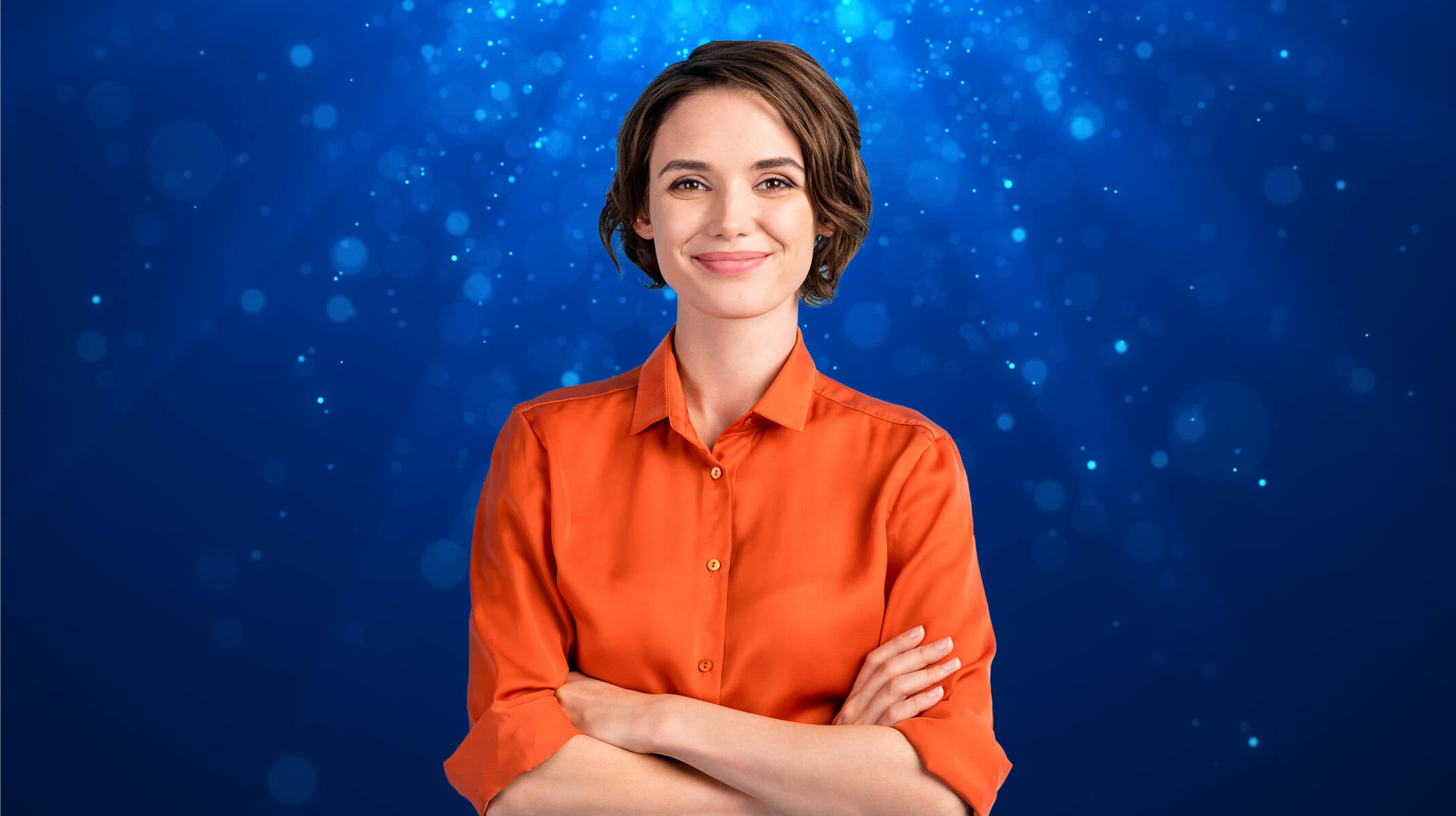 Woman smiling with arms folded