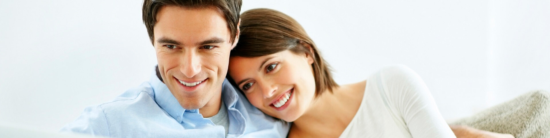 couple looking at laptop