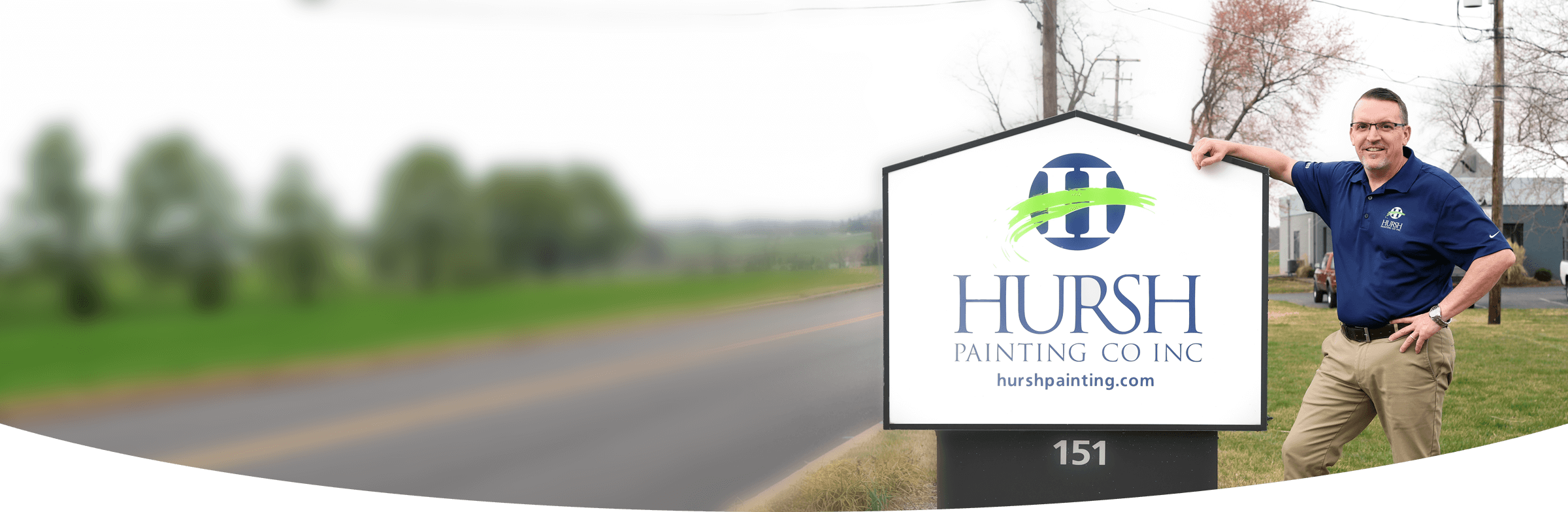 Phil Hursh with Sign